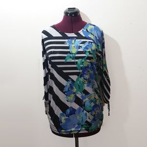 Black and White Striped Top with Floral Design